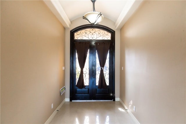 entryway with vaulted ceiling