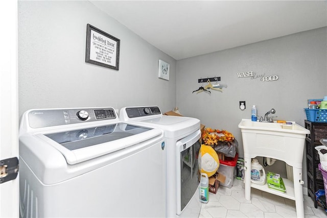 laundry room featuring washing machine and dryer