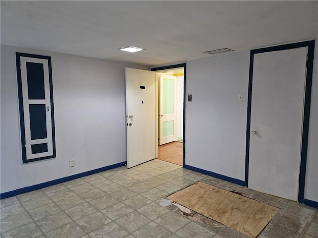 325 S Saunders St S, Aransas Pass, TX 78336 - empty room with visible vents and baseboards