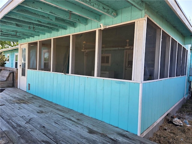 325 S Saunders St S, Aransas Pass, TX 78336 - view of home's exterior with a wooden deck and a sunroom