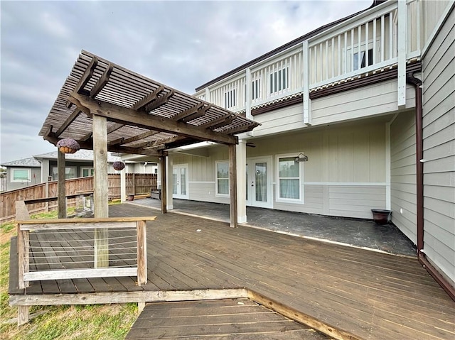 wooden deck featuring a pergola