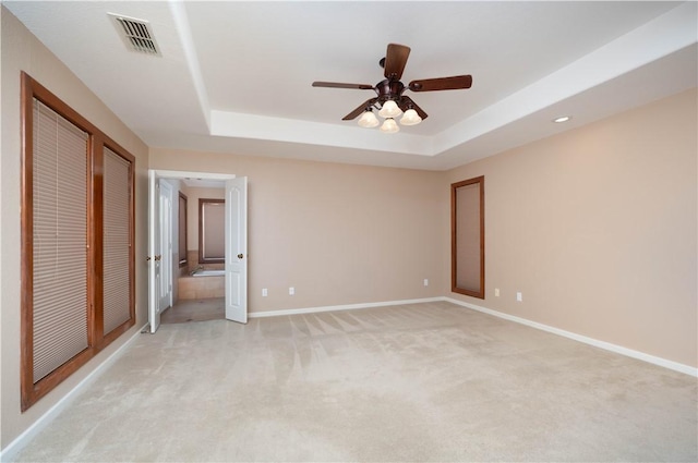 8018 Mt Zion, Corpus Christi, TX 78413 - unfurnished bedroom with light colored carpet, a raised ceiling, and baseboards