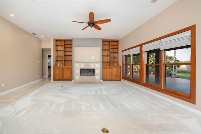 8018 Mt Zion, Corpus Christi, TX 78413 - unfurnished living room with baseboards, built in shelves, light colored carpet, and recessed lighting