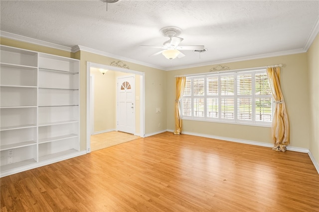 4410 Marie St, Corpus Christi, TX 78411 - spare room with light wood finished floors, ceiling fan, a textured ceiling, baseboards, and ornamental molding