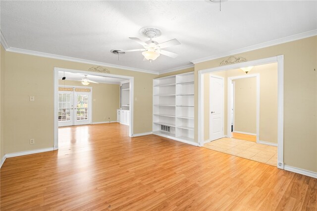4410 Marie St, Corpus Christi, TX 78411 - empty room featuring ceiling fan, light wood-style flooring, crown molding, baseboards, and built in features