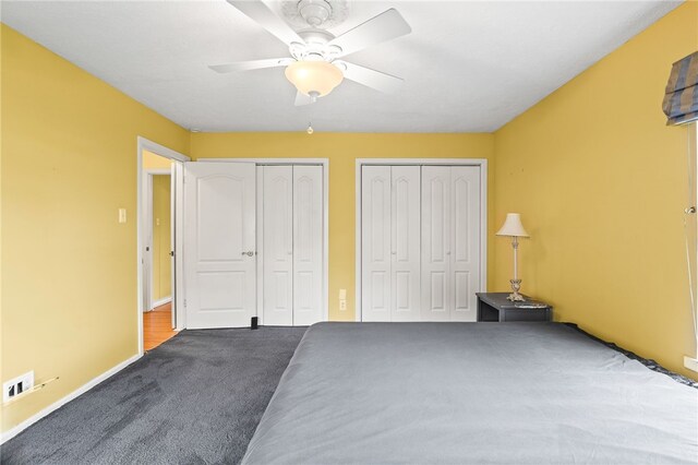 4410 Marie St, Corpus Christi, TX 78411 - bedroom featuring two closets, carpet, a ceiling fan, and baseboards