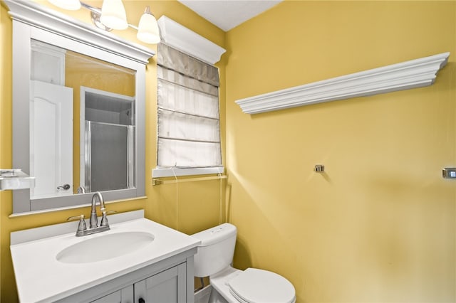 4410 Marie St, Corpus Christi, TX 78411 - bathroom featuring toilet, vanity, and an enclosed shower