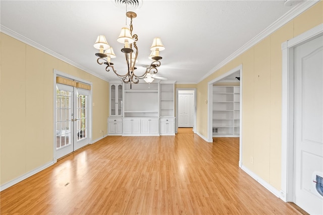 4410 Marie St, Corpus Christi, TX 78411 - unfurnished dining area with crown molding, a chandelier, light wood-style flooring, built in features, and baseboards