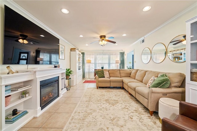 living room with recessed lighting, light tile patterned flooring, ceiling fan, crown molding, and plenty of natural light