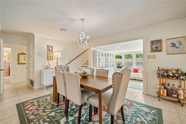dining area with crown molding, visible vents, an inviting chandelier, light tile patterned flooring, and stairs