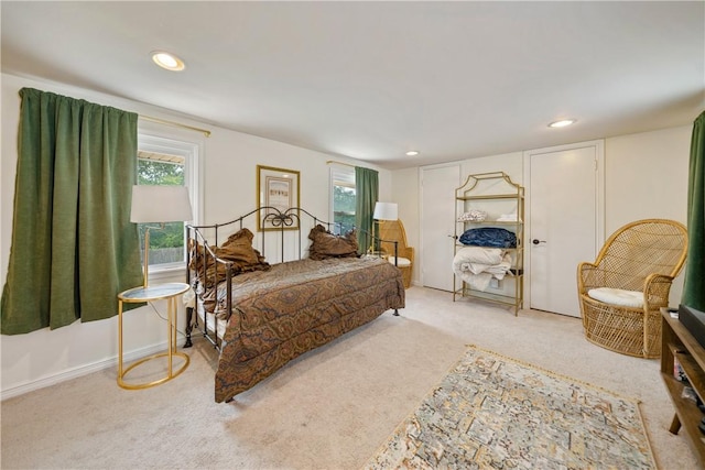 bedroom featuring recessed lighting and carpet floors