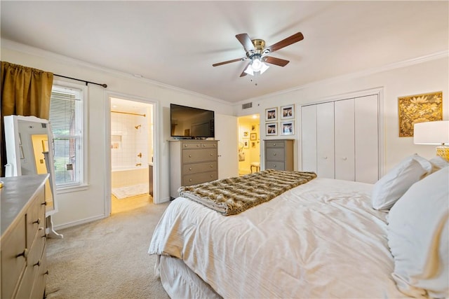 bedroom featuring visible vents, light carpet, connected bathroom, and crown molding
