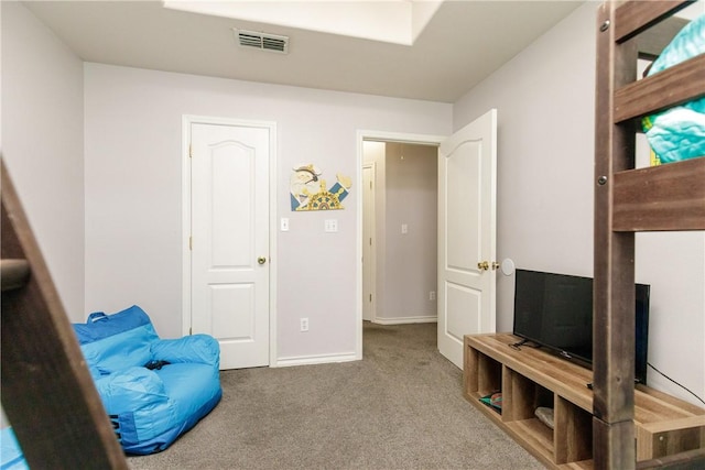 sitting room with carpet flooring