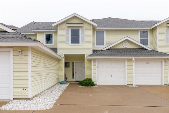 view of front of property with a garage