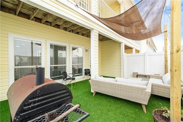 view of patio / terrace featuring a grill and an outdoor hangout area