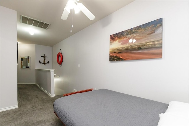 bedroom with ceiling fan, carpet, and lofted ceiling