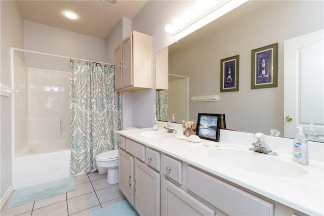 full bathroom featuring tile patterned flooring, toilet, vanity, and shower / tub combo with curtain