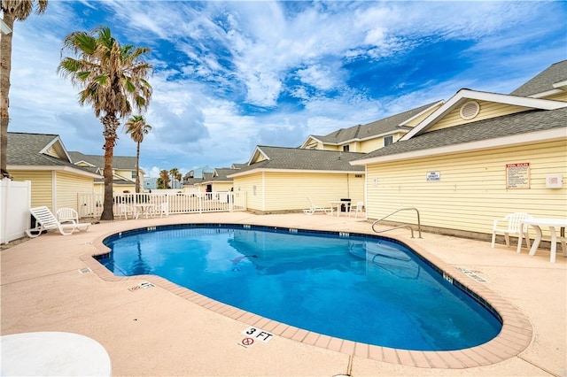 view of pool featuring a patio