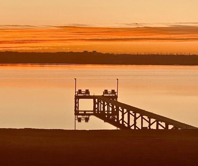 299 Bay Dr, Palacios, TX 77465 - dock area featuring a water view and boat lift
