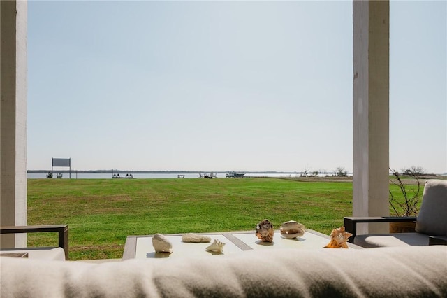 299 Bay Dr, Palacios, TX 77465 - view of green lawn featuring a water view