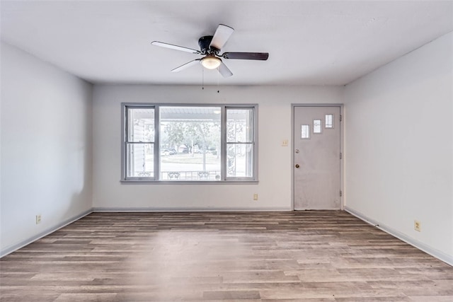 entryway featuring ceiling fan and light hardwood / wood-style floors