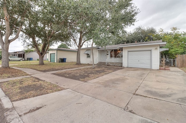 ranch-style house featuring a garage