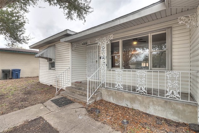 entrance to property featuring covered porch