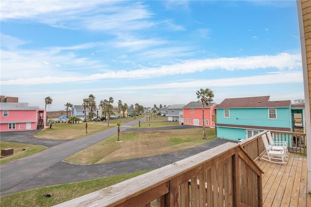 wooden deck with a residential view