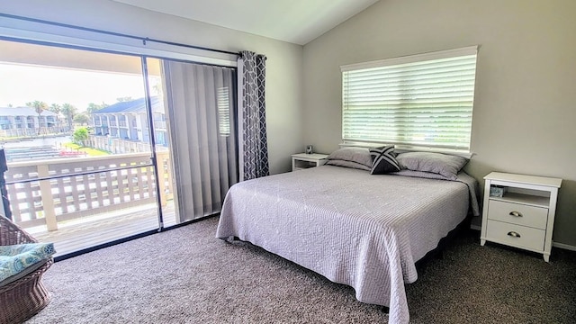 carpeted bedroom featuring access to outside and vaulted ceiling