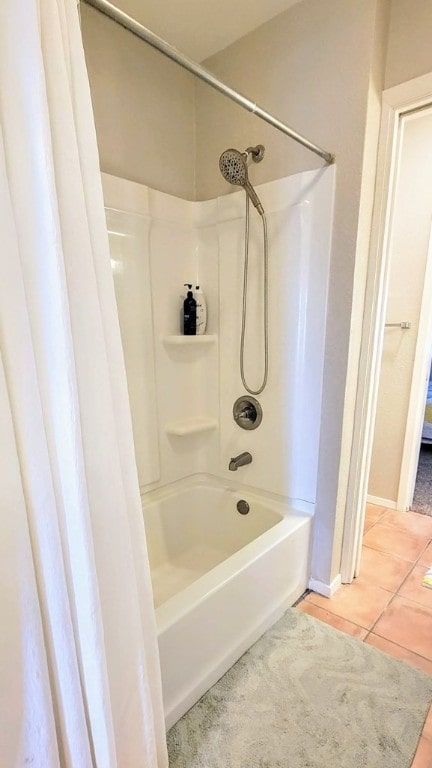 bathroom featuring bathtub / shower combination and tile patterned floors