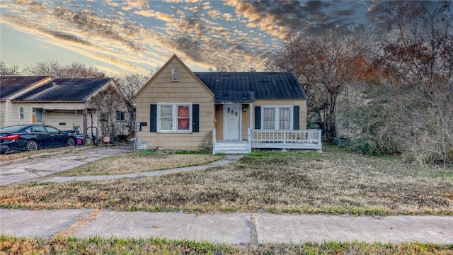 view of front of house with a yard