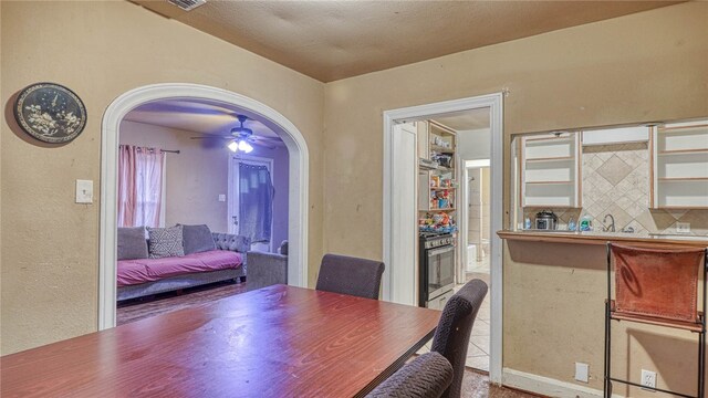 dining area featuring ceiling fan