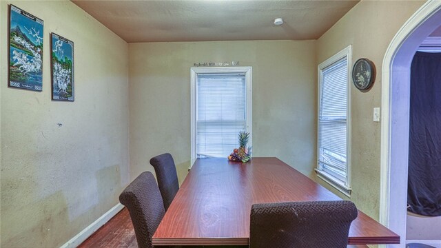 unfurnished dining area with hardwood / wood-style flooring