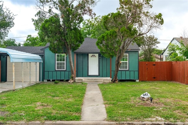 641 Caddo St, Corpus Christi, TX 78412 - bungalow-style house with a shingled roof, board and batten siding, and concrete driveway
