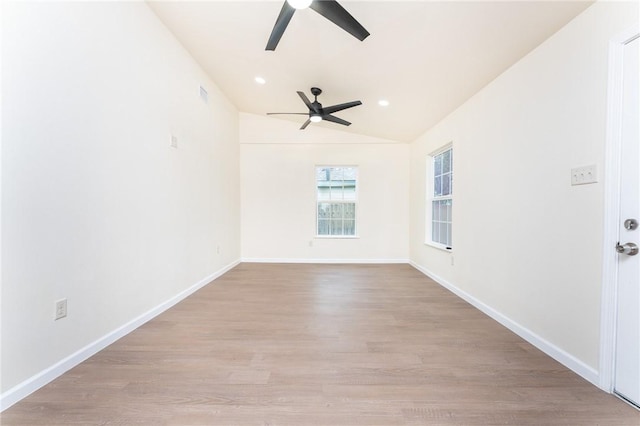 641 Caddo St, Corpus Christi, TX 78412 - spare room with a ceiling fan, light wood finished floors, vaulted ceiling, baseboards, and recessed lighting