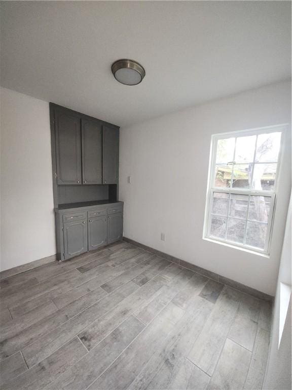 empty room featuring light hardwood / wood-style floors