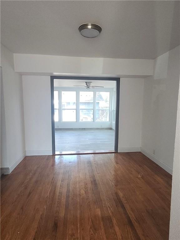 empty room featuring dark hardwood / wood-style floors