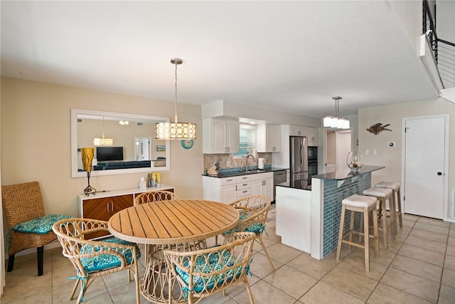 tiled dining space with sink