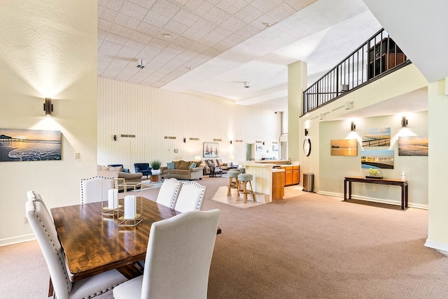 1400 Ocean Dr Unit 904-B, Corpus Christi, TX 78404 - dining space with light colored carpet and a high ceiling