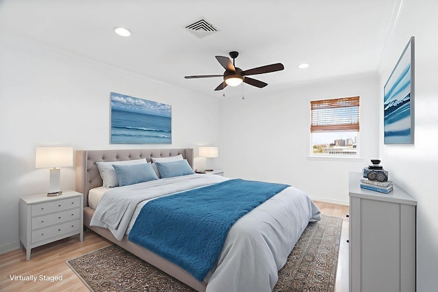 1400 Ocean Dr Unit 904-B, Corpus Christi, TX 78404 - bedroom with light wood-style flooring, recessed lighting, crown molding, and a ceiling fan