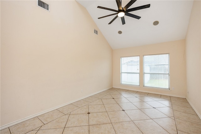 spare room with high vaulted ceiling, light tile patterned floors, and ceiling fan