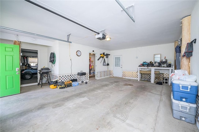 garage featuring a garage door opener