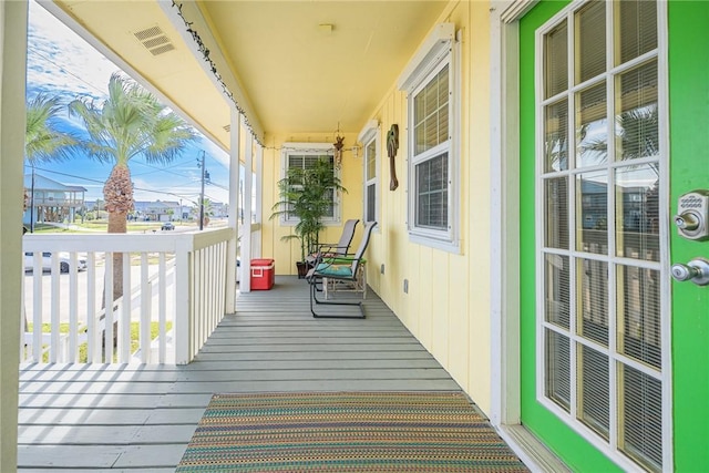 balcony featuring a porch