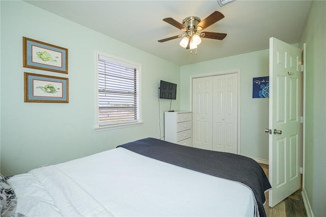 bedroom featuring a closet, ceiling fan, and wood-type flooring