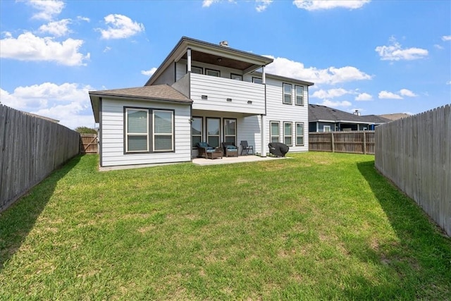 1805 Bay Landing Dr, Portland, TX 78374 - rear view of property featuring a balcony, a fenced backyard, and a patio