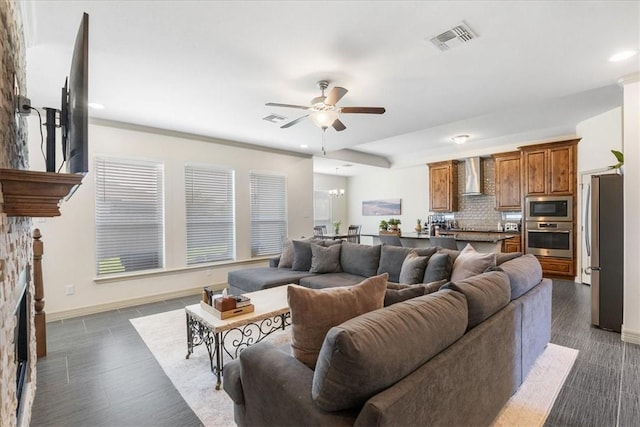 1805 Bay Landing Dr, Portland, TX 78374 - living room with ceiling fan, a stone fireplace, and recessed lighting