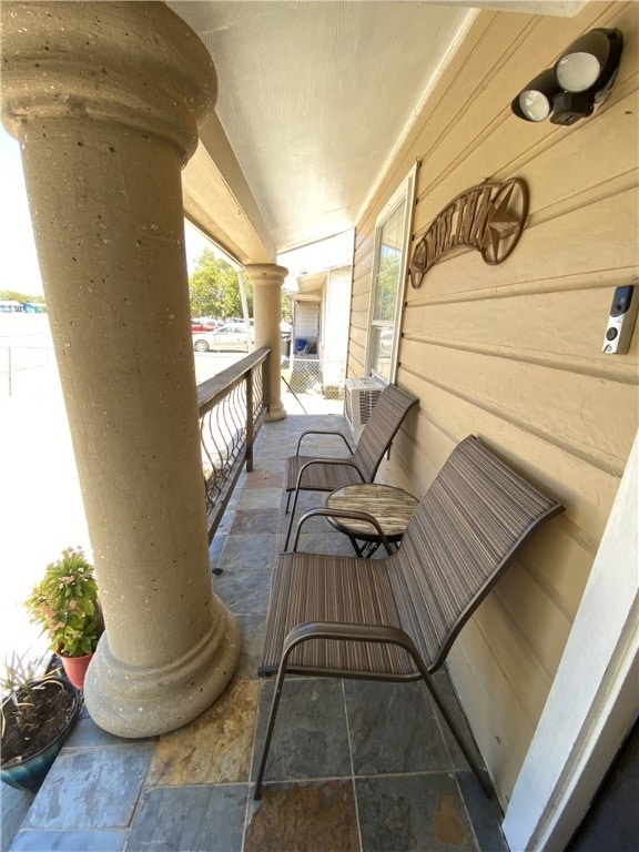 balcony featuring a porch