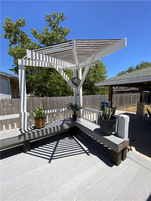 wooden terrace featuring a pergola