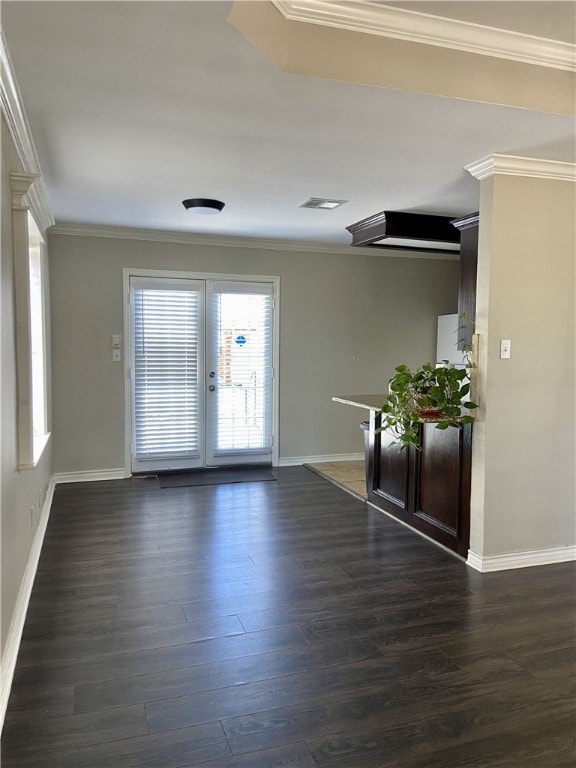 1038 Dorthy Dr, Corpus Christi, TX 78412 - spare room featuring crown molding, dark wood-style floors, and french doors