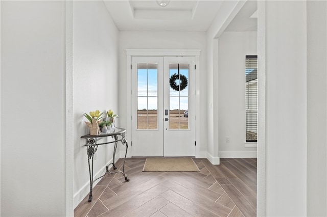 foyer featuring french doors and hardwood / wood-style flooring